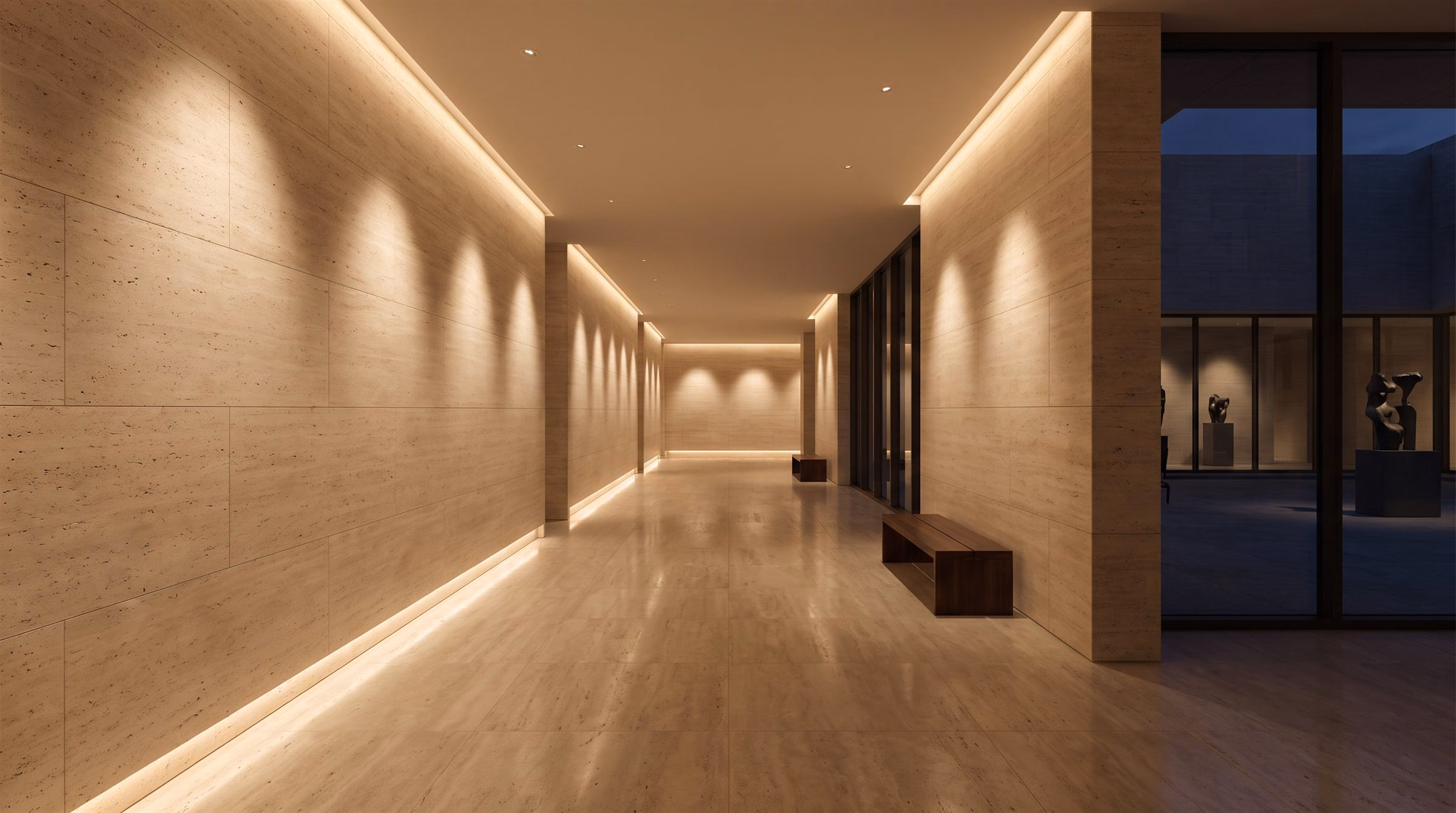 Corridor in a cultural building at night with rhythmic warm wall-washing light on travertine walls